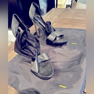 Fendi heels with fun strap over